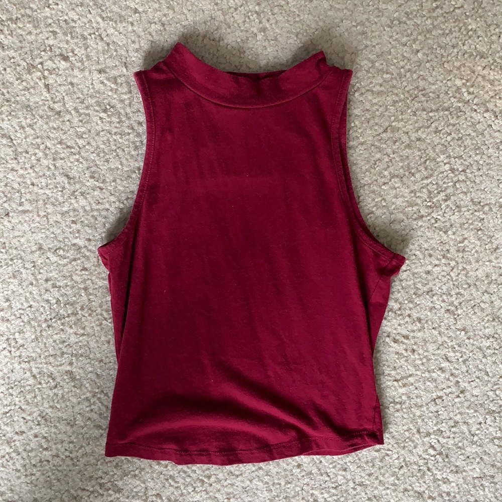 Burgundy tank top. Size medium.